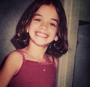 Rita Ora childhood